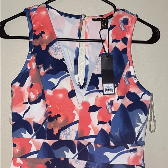 Revamped Floral Romper - Picture 2 of 5